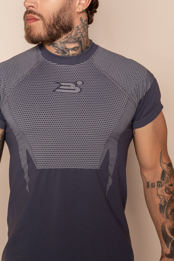 Camiseta deportiva de manga corta con paneles de compresión