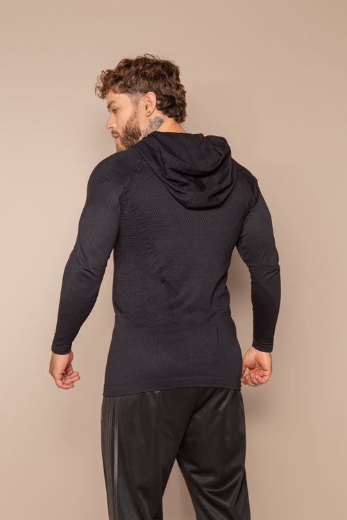 Buso deportivo de manga larga con capucha de diseño geométrico
